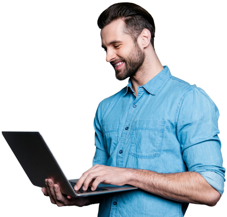 Clean-cut man with pale skin tone smiling happily at laptop.